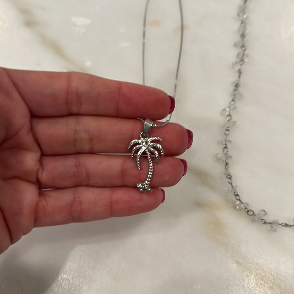 3 necklaces. Palm tree necklace. Clear beaded necklace. Black/clear necklace. - Picture 3 of 5
